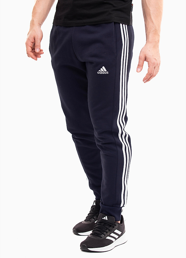 adidas Pantaloni bărbați Essentials French Terry Tapered Cuff 3-Stripes IC9406 adidas Pantaloni bărbați Essentials French Terry Tapered Cuff 3-Stripes IC9406