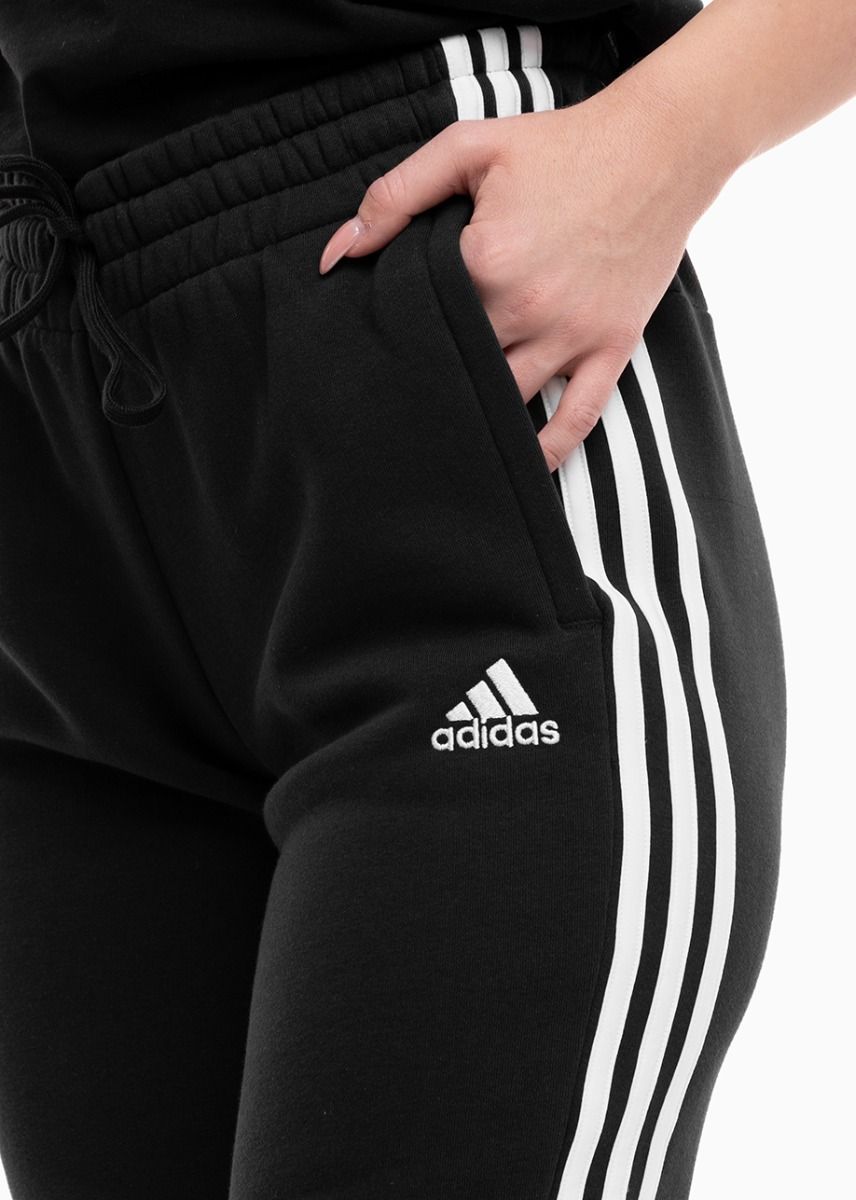 adidas Pantaloni pentru femei Essentials 3-Stripes Fleece Cuffed HZ5753