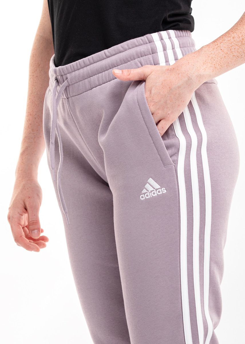 adidas Pantaloni pentru femei Essentials 3-Stripes Fleece Cuffed IR5403