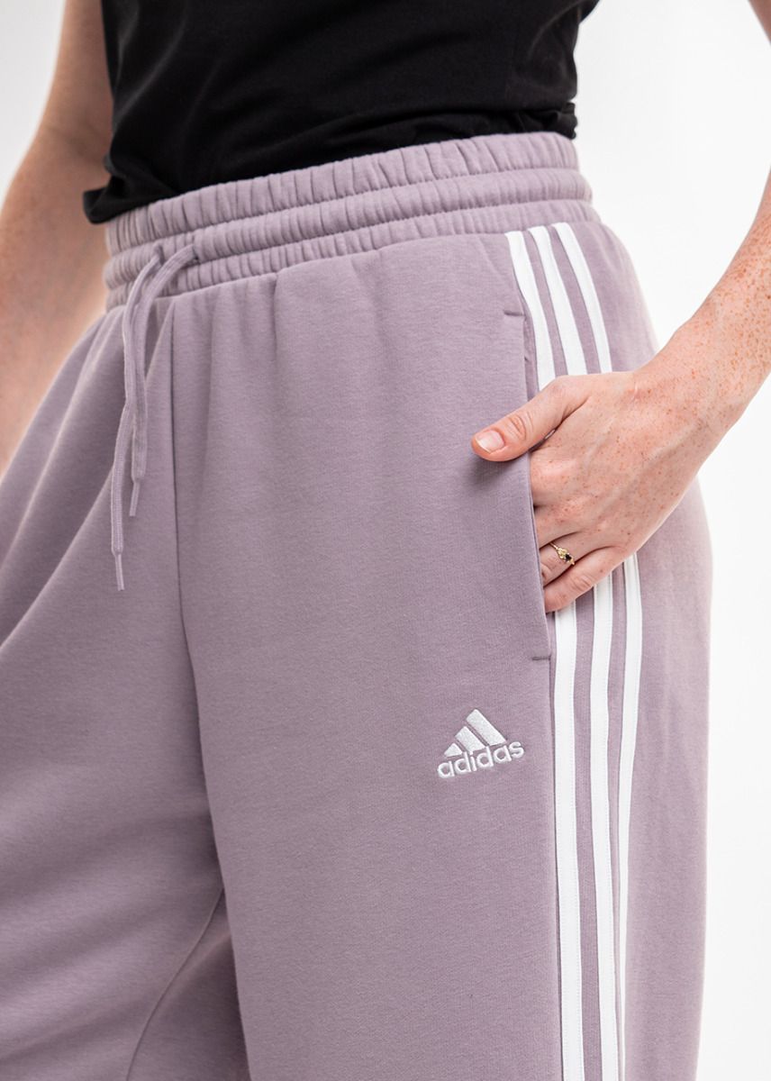 adidas Pantaloni pentru femei Essentials 3-Stripes Open Hem Fleece IR5387