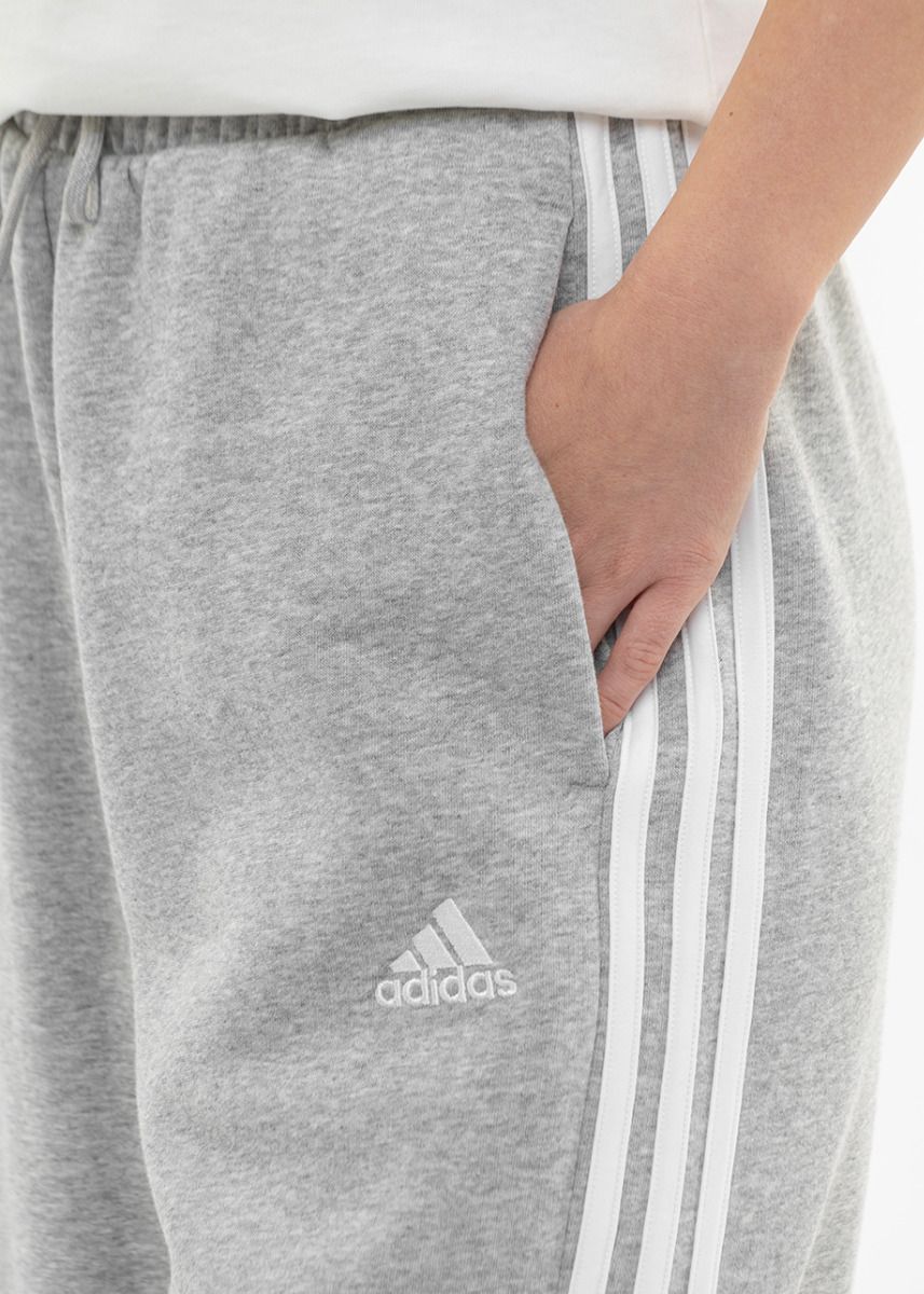 adidas Pantaloni pentru femei Essentials 3-Stripes Open Hem Fleece IM0247