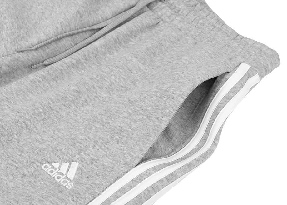 adidas Pantaloni pentru femei Essentials 3-Stripes Open Hem Fleece IM0247