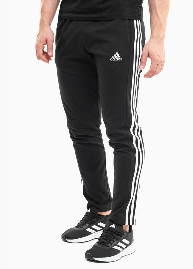 adidas Pantaloni bărbați Essentials Single Jersey Tapered Open Hem 3-Stripes IC0044 adidas Pantaloni bărbați Essentials Single Jersey Tapered Open Hem 3-Stripes IC0044